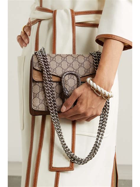 Trying to decide between gucci Dionysus mini/small in